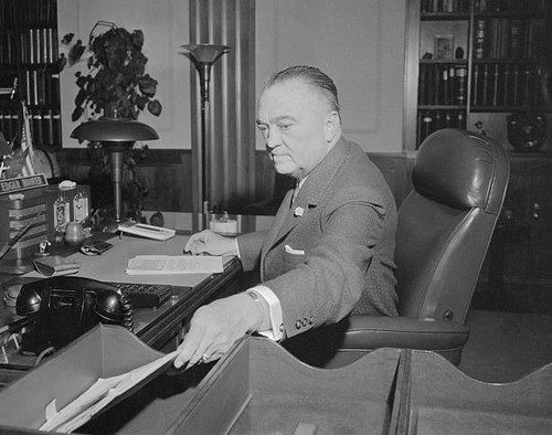 Edgar hoover shown desk at - edgar,